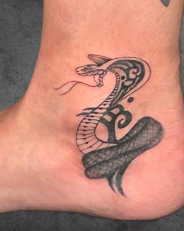 Snake cover-up tattoo, ankle